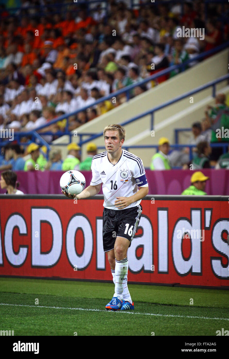 Philipp Lahm of Germany throws the ball during UEFA EURO 2012 game against Netherlands Stock Photo