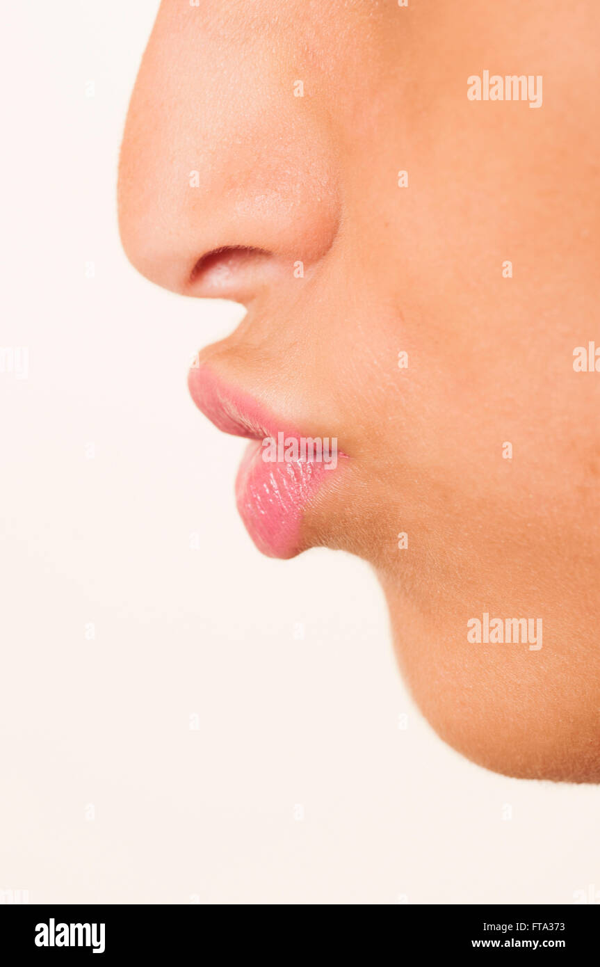 Side view close up of a young woman's mouth and nose Stock Photo