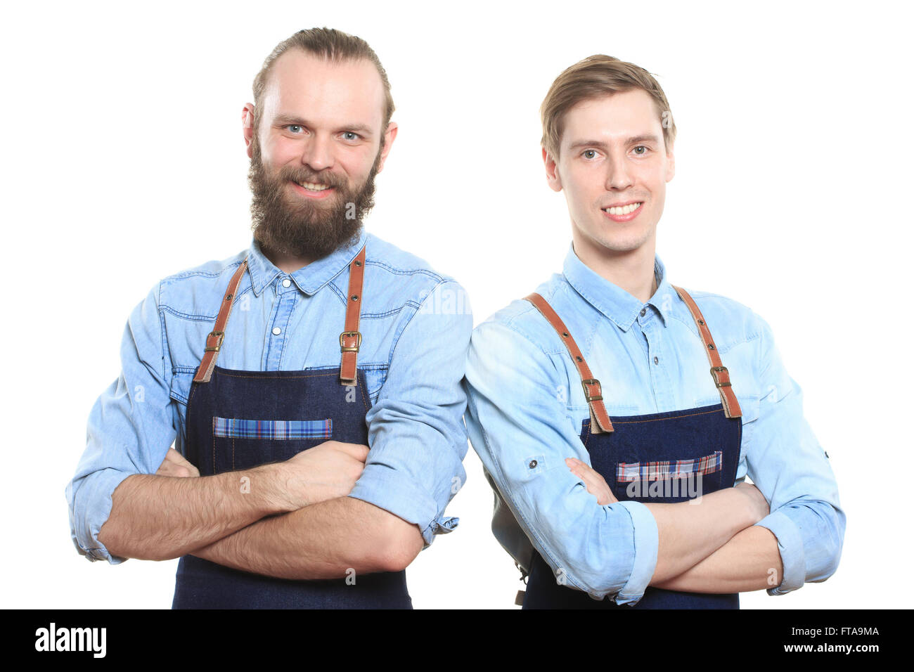 two bartender with a shaker and bottle on white background. behind the