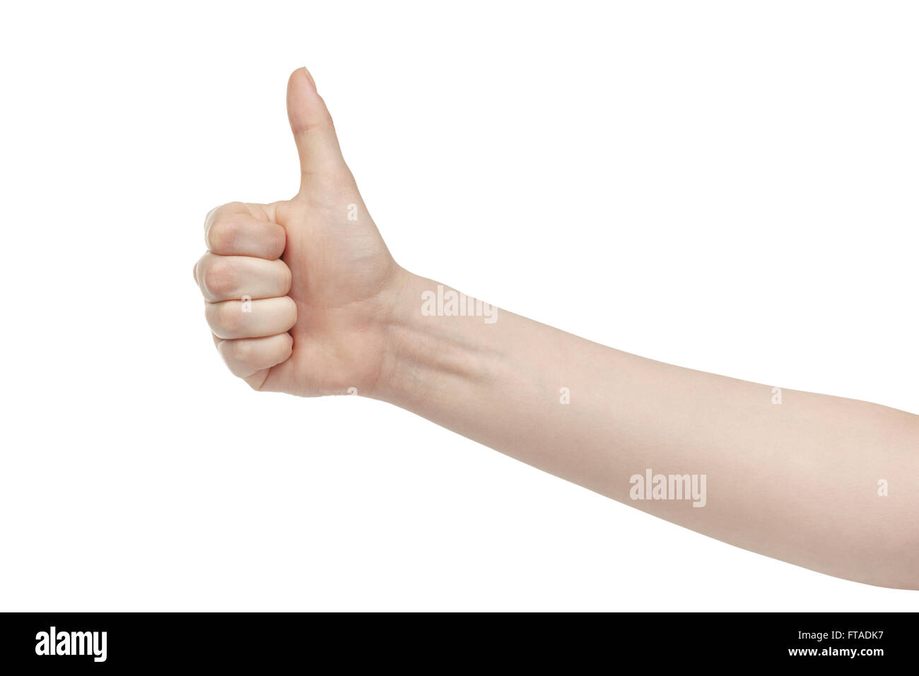 young woman right hand shows thumb up gesture Stock Photo