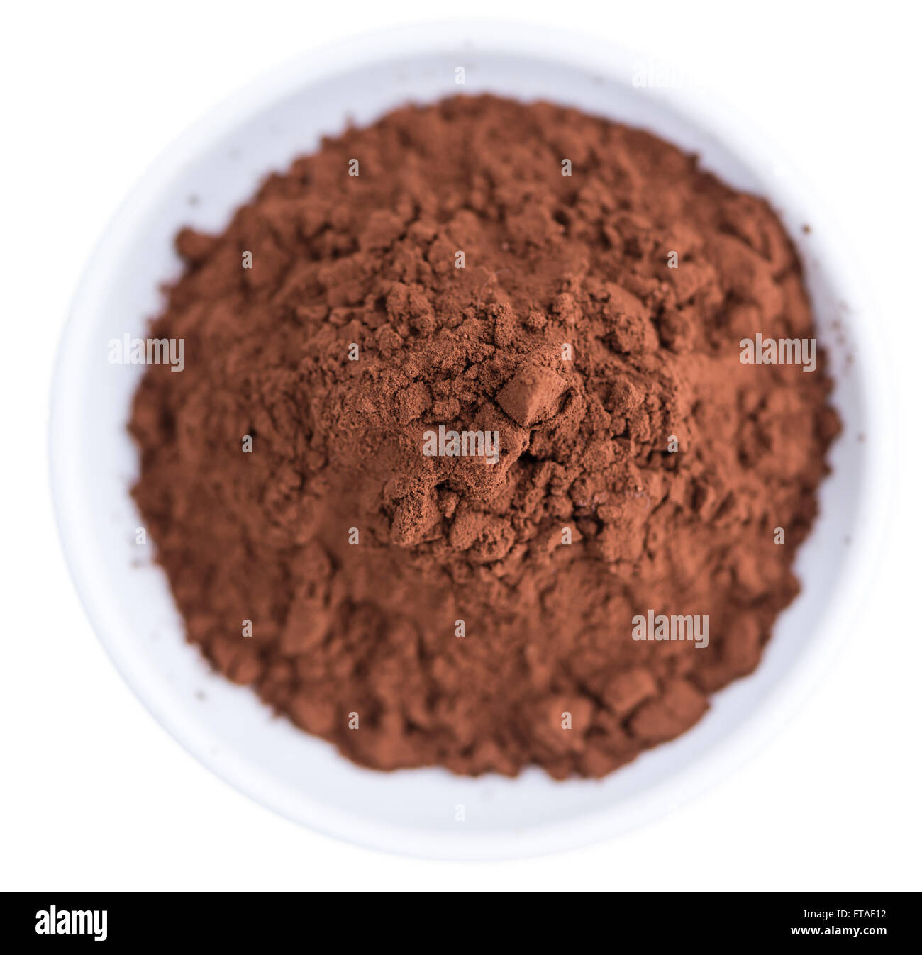 Portion of Cocoa powder (selective focus) as detailed close-up shot isoalted on white background Stock Photo