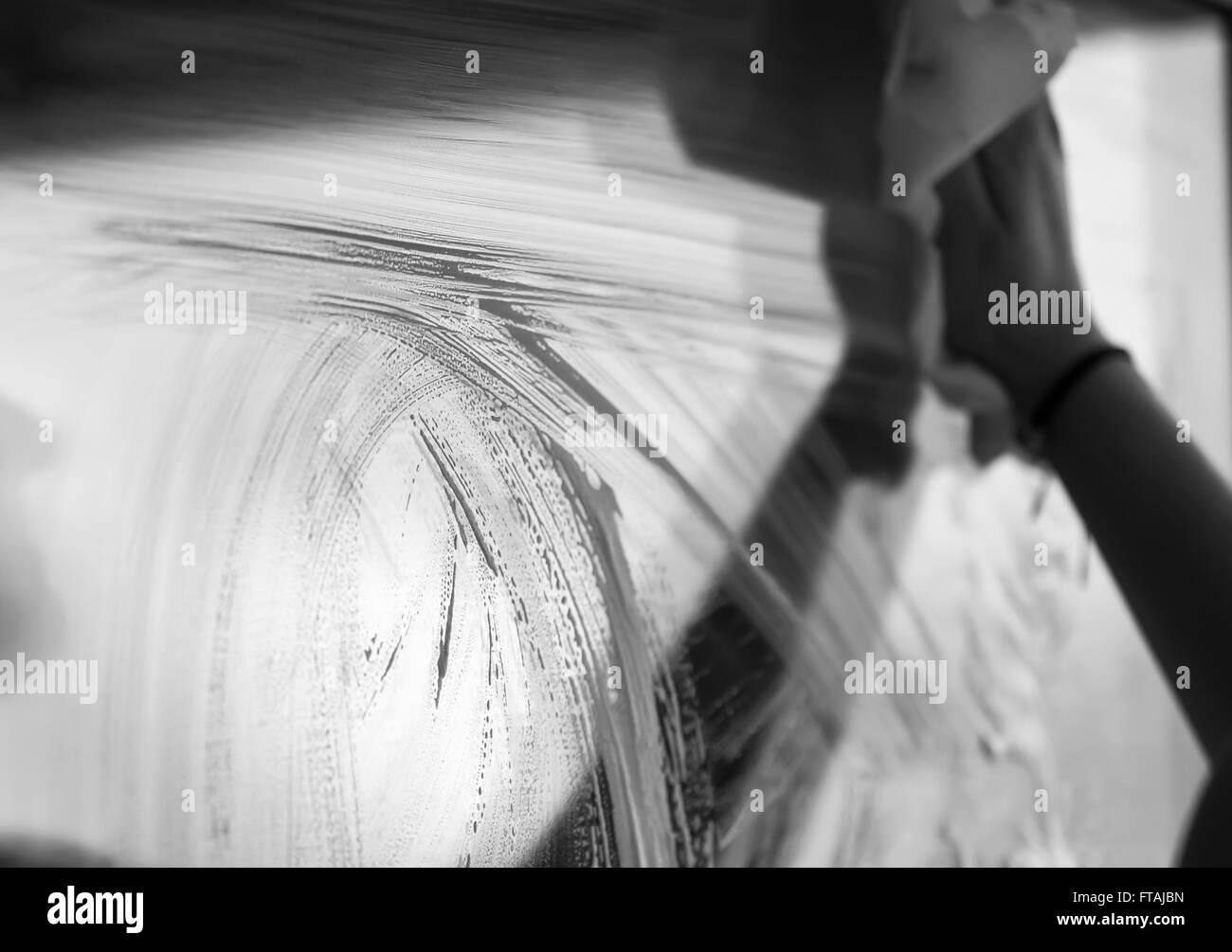 young woman washing windows, black and white Stock Photo - Alamy