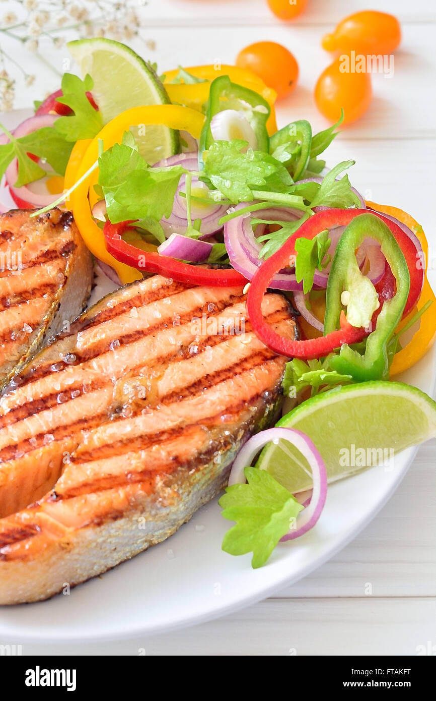 Grilled salmon with vegetables on a plate Stock Photo Alamy