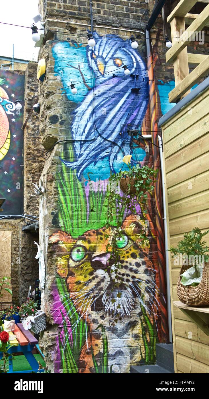 London street art uk wildlife. Brixton street art mural London graffiti on buildings Stock Photo
