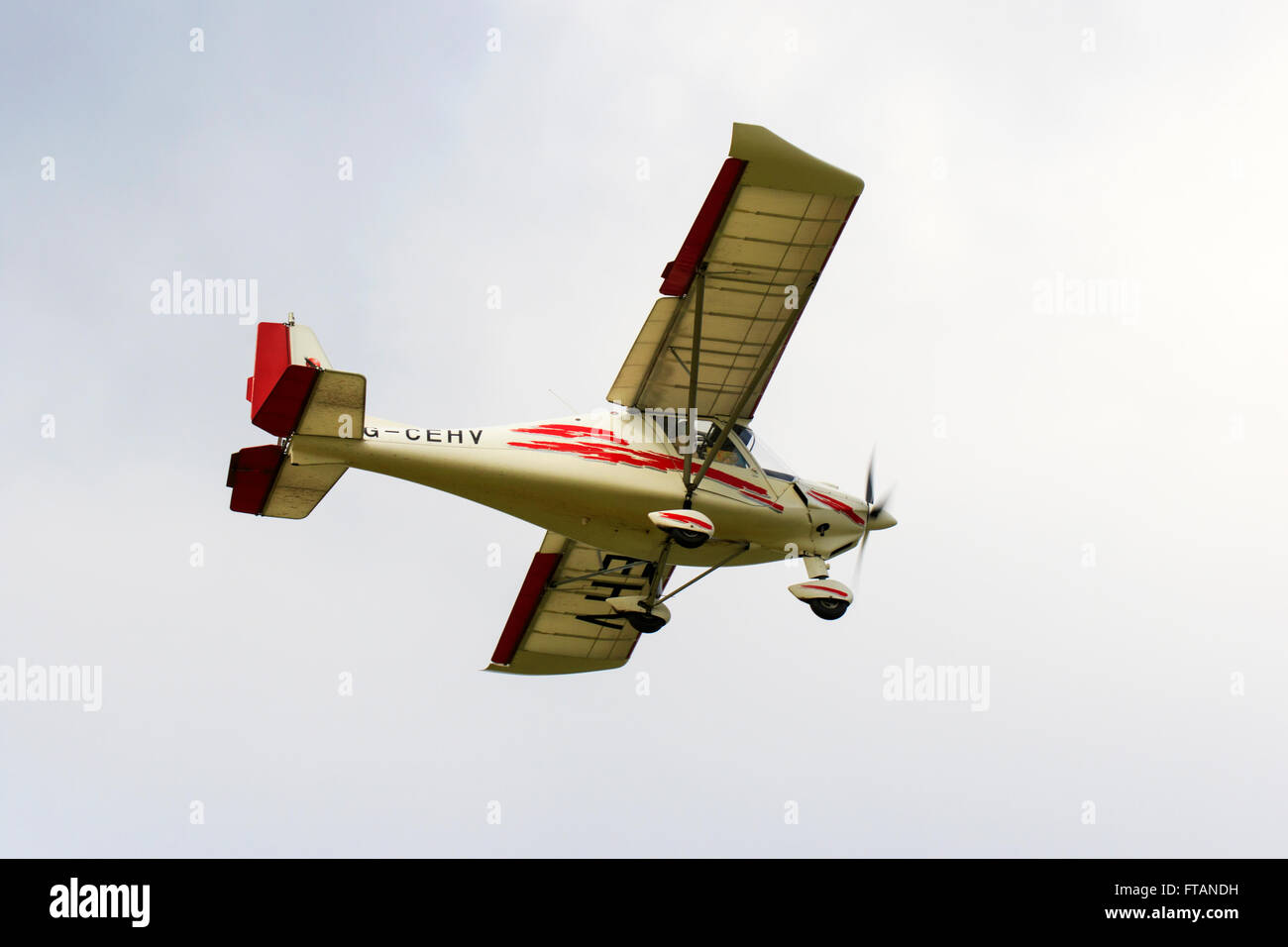 Ikarus C42 FB80 G-CEHV in flight over Netherthorpe Airfield Stock Photo