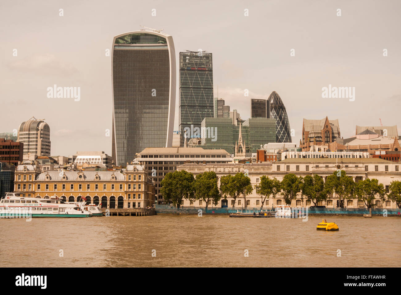 A view of the London skyline including the Gherkin,Cheesegrater and Walkie Talkie buildings and the River Thames Stock Photo