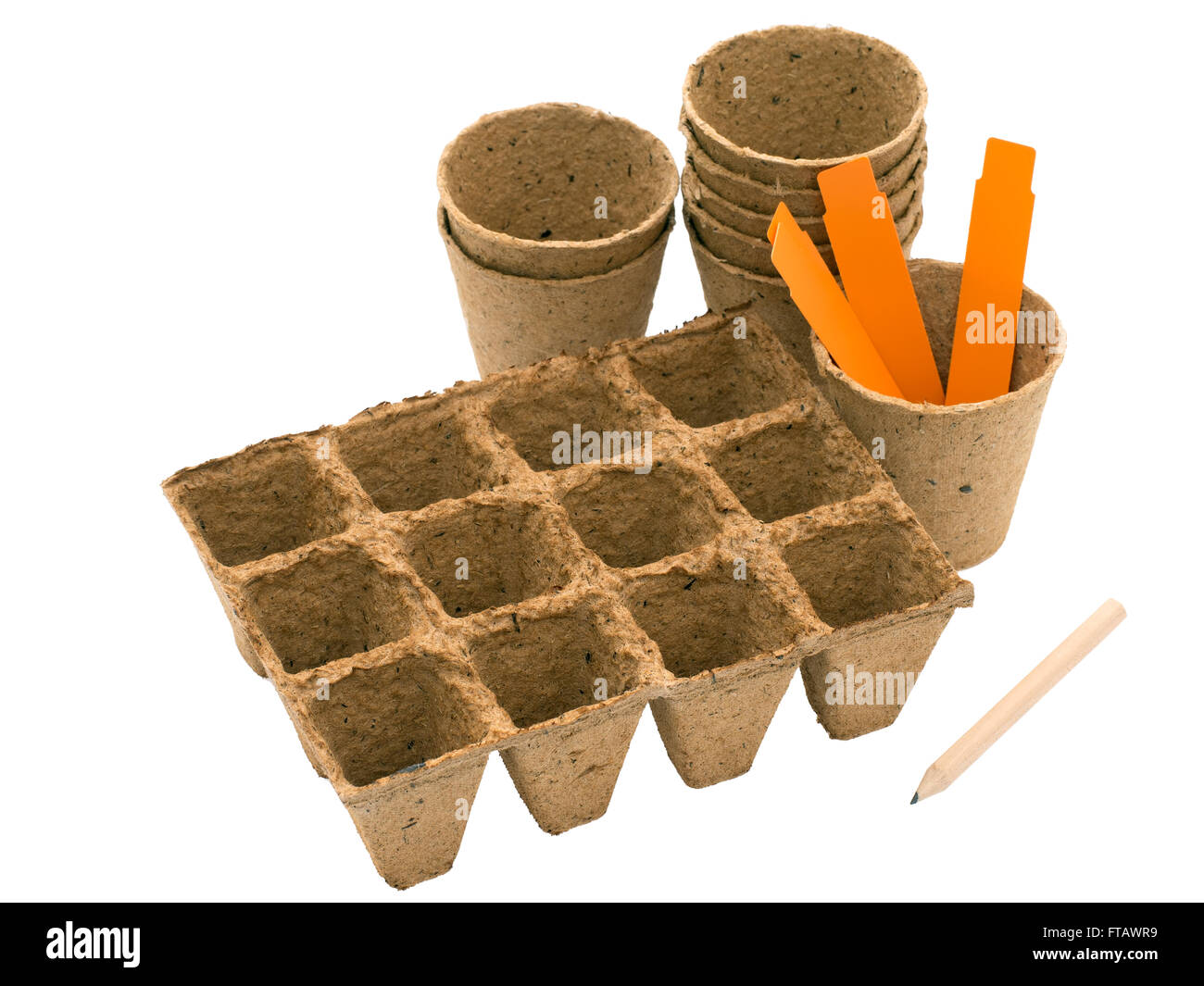 Spring gardening - pots, labels and pencil, isolated on white. Stock Photo