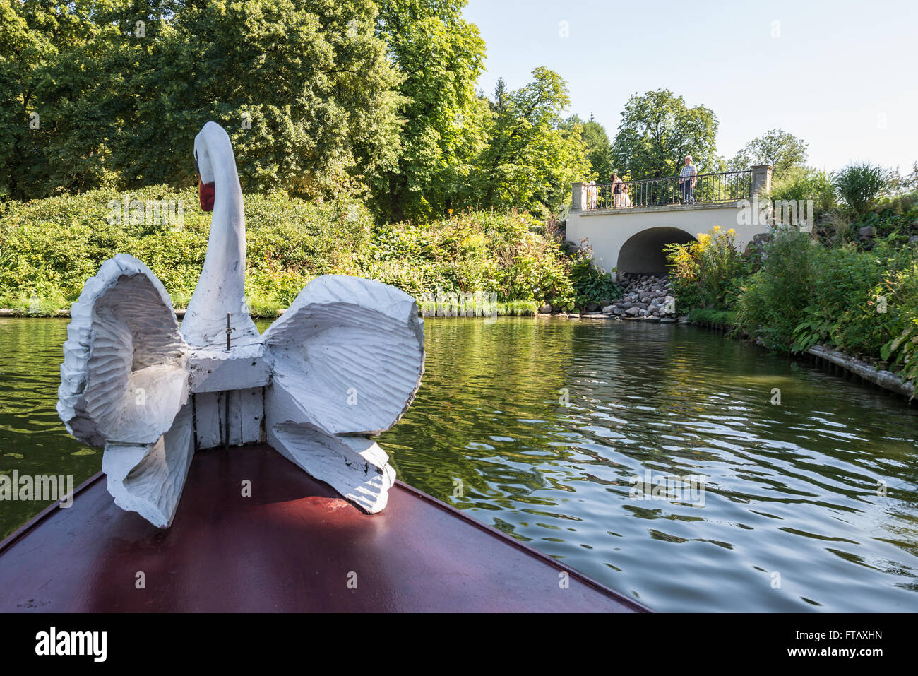 swan figure on the gondola boat in Lazienki Krolewskie (Royal Baths Park) in Warsaw, Poland Stock Photo