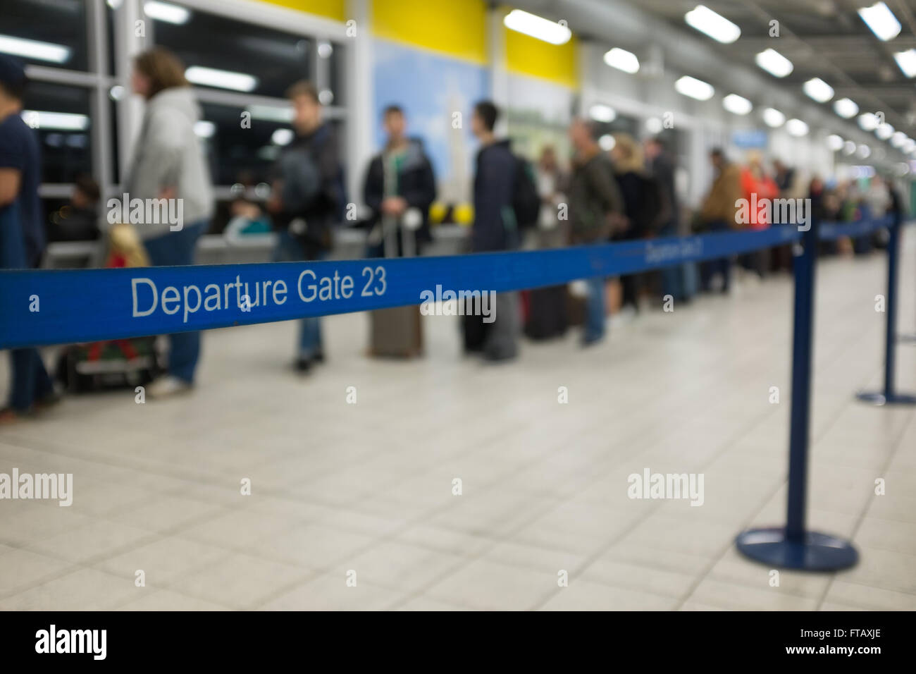 Queue of passengers at departures at Luton airport uk Stock Photo