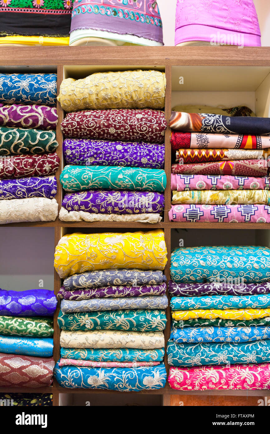 Colorful Indian and Asian fabric in retail display Stock Photo