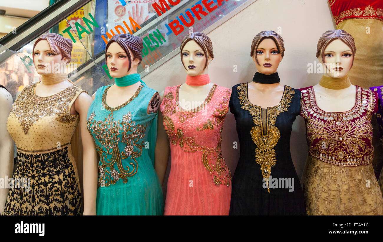 Shop mannequins in Indian dresses and saris in retail display Stock Photo