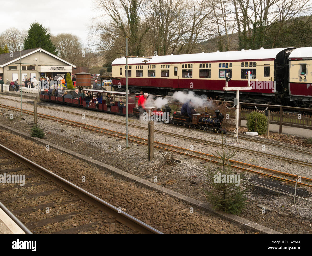 Miniature steam train rides at Betws-y-Coed Railway Station Conwy North Wales on the site of the old railway goods yard school holiday attraction Stock Photo