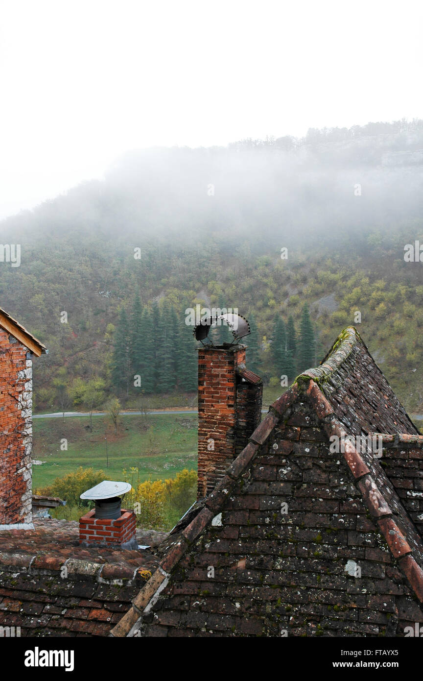 Early morning mist over the valley. Rocamadour Stock Photo