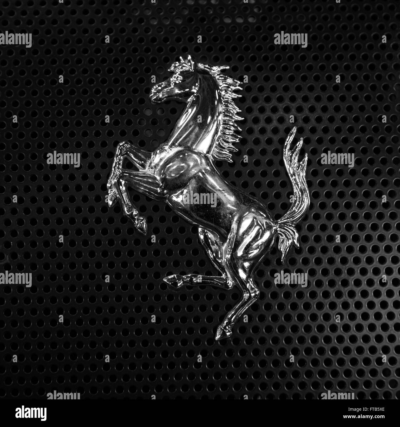 Verona, Italy - May 09,2015: The famous Ferrari 'prancing horse' symbol in silver version. Stock Photo