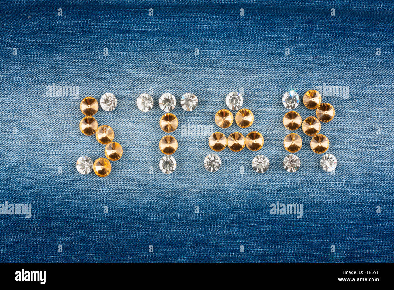 Inscription STAR made of rhinestones on jeans background Stock Photo ...