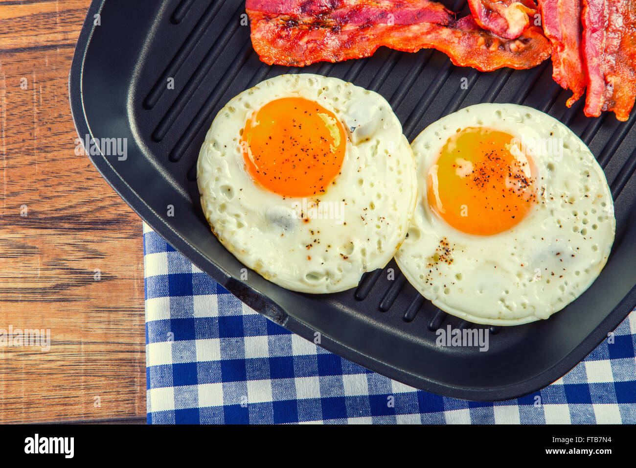 Ham and Egg. Bacon and Egg. Salted egg and sprinkled with black pepper