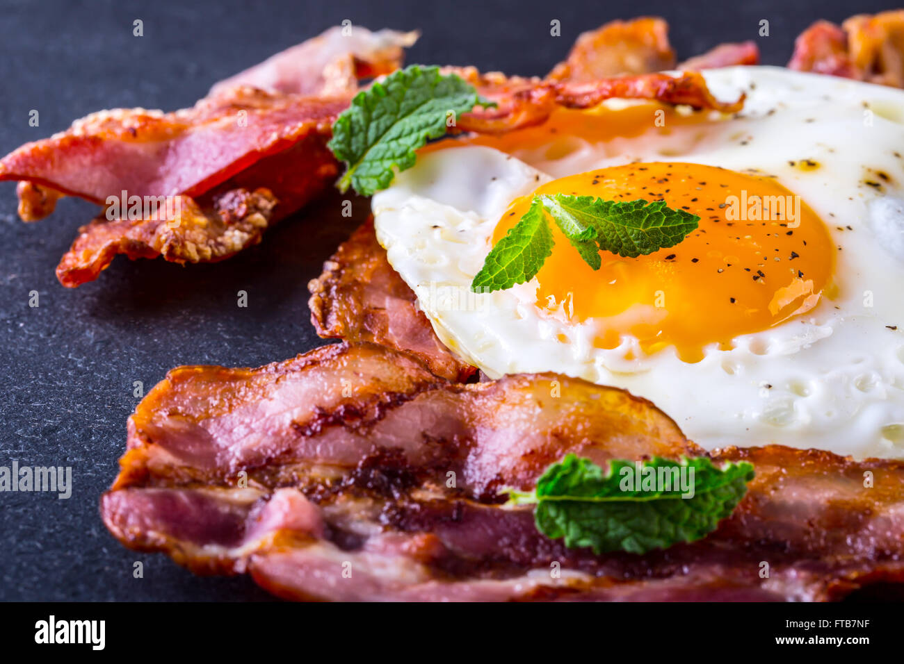 Ham and Egg. Bacon and Egg. Salted egg and sprinkled with black pepper