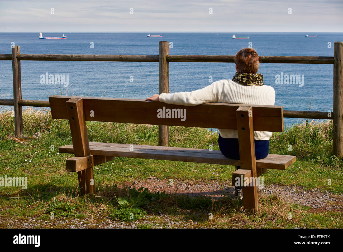 Woman looking the sea Stock Photo - Alamy