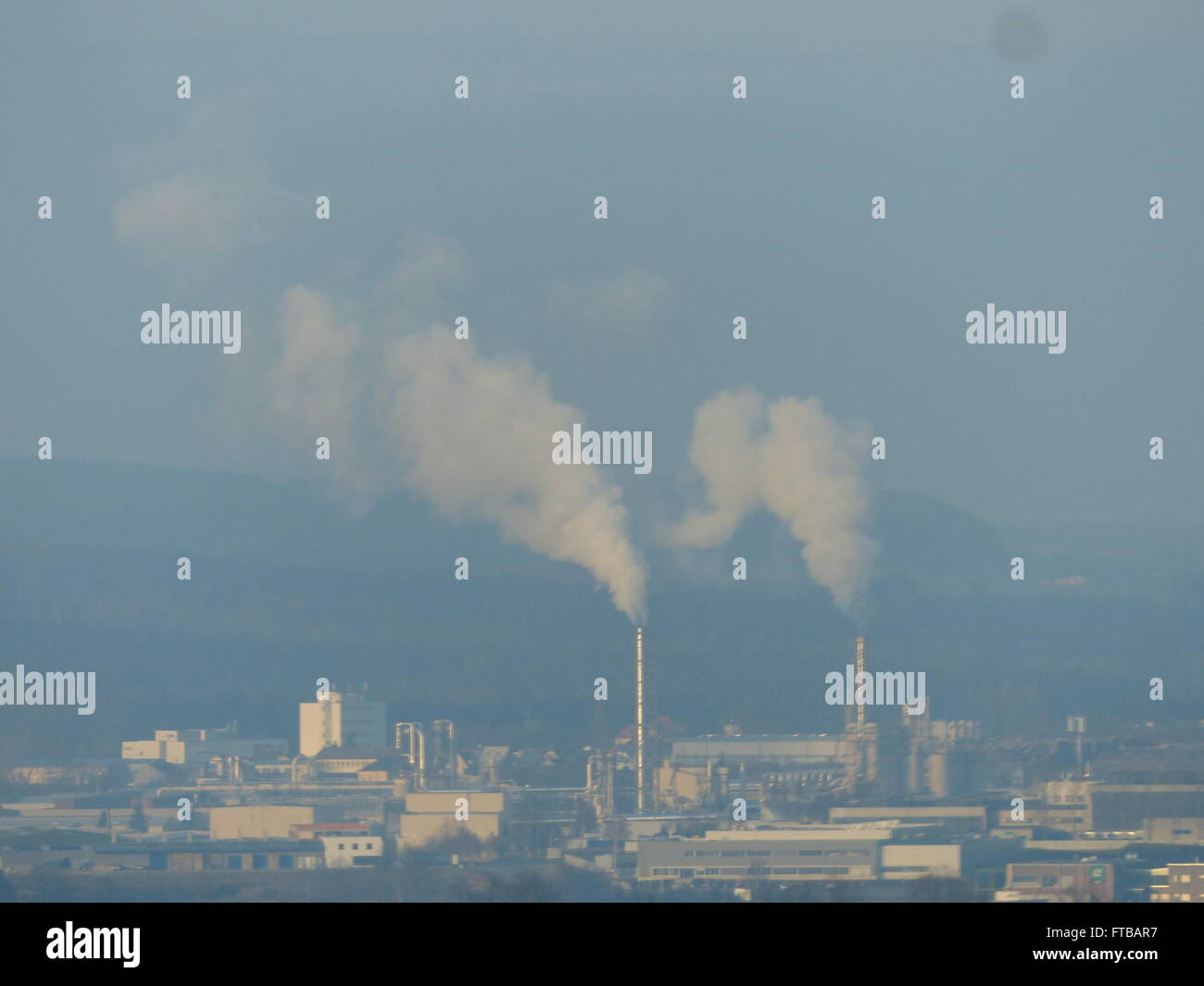 Factory chimneys with smoke Stock Photo