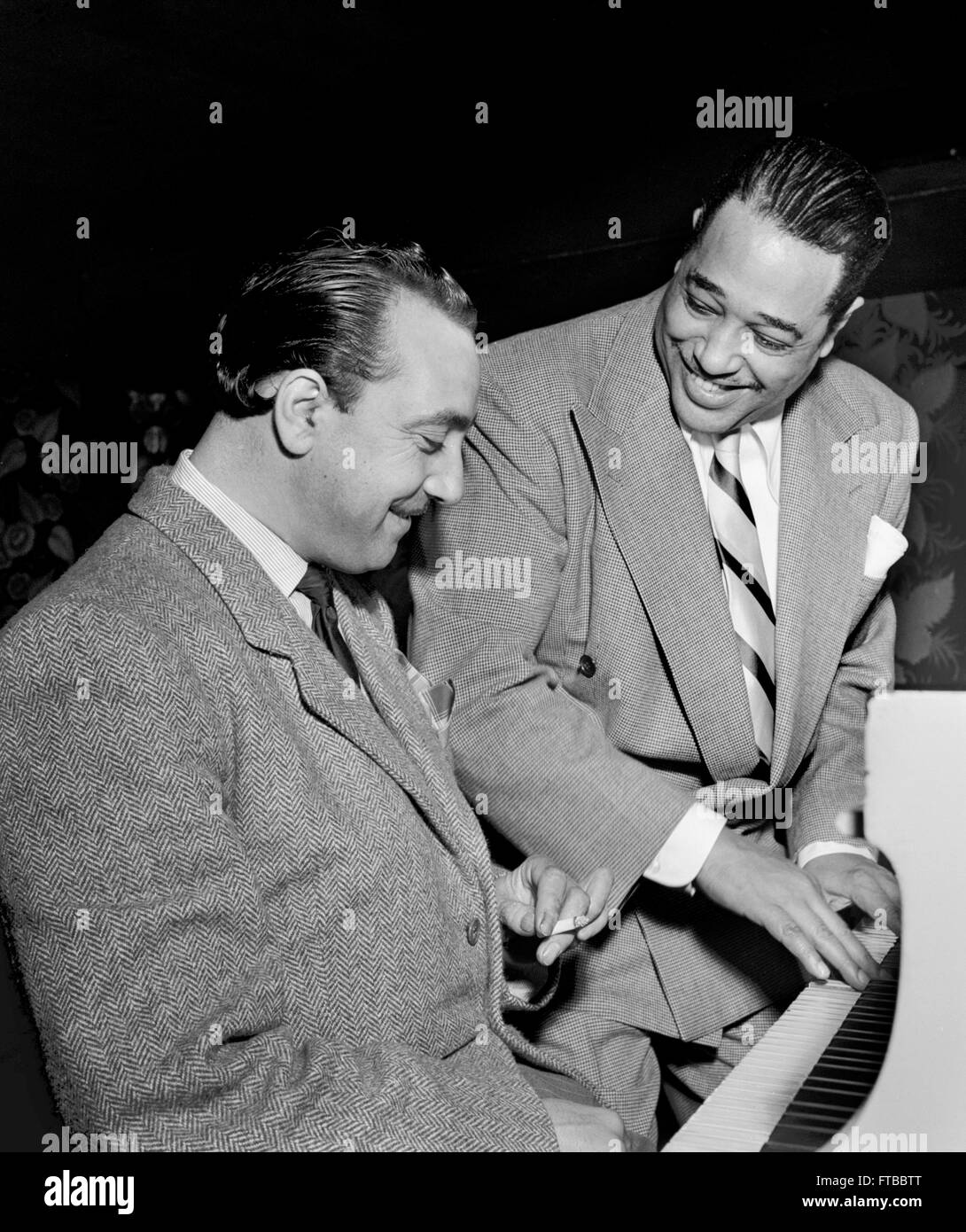 Django Reinhardt and Duke Ellington. c. 1946. Stock Photo