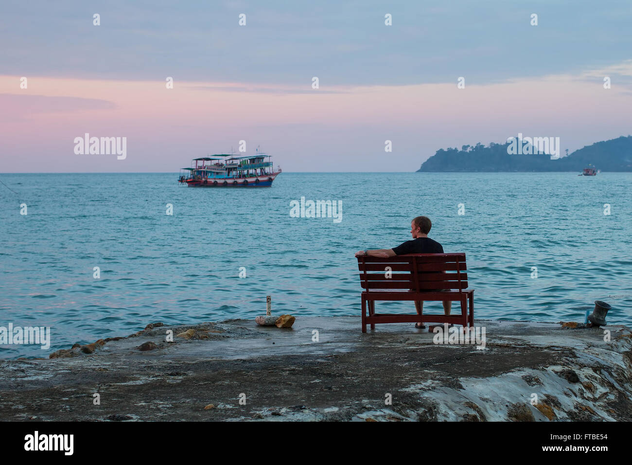 Silhouette lonely man on shore hi-res stock photography and images - Alamy