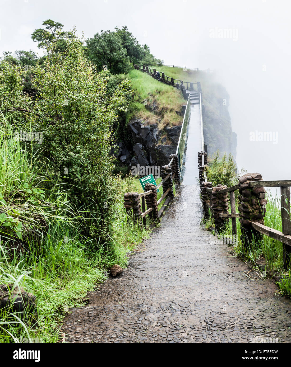 Knife Edge Bridge at Mosi-oa-Tunya (Victoria Falls) where the spray as at its strongest, often obscuring the view of the Falls. Stock Photo