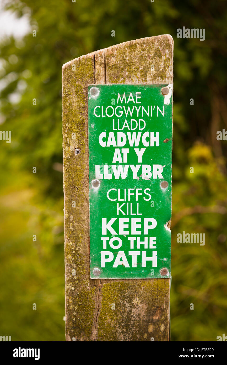 Cliffs kill sign on the Pembrokeshire coastal path, Wales Stock Photo ...