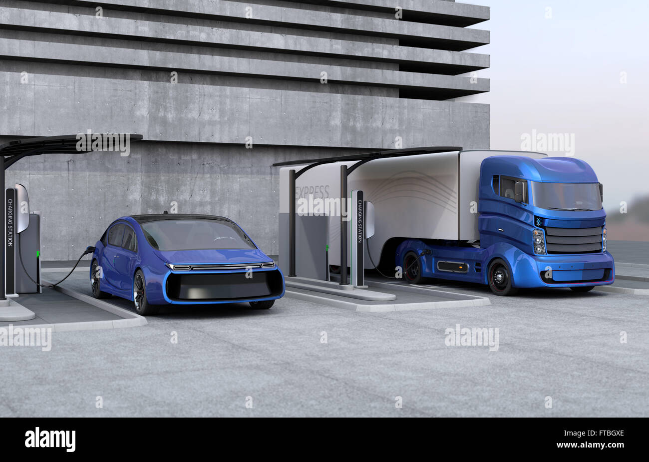 Hybrid electric truck and white electric car in charging station Stock Photo