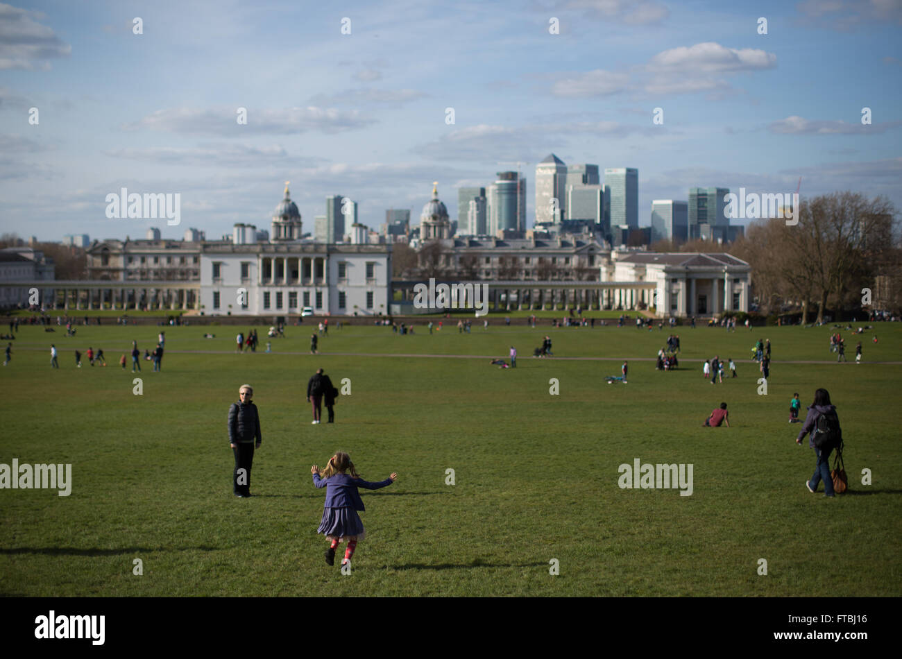 Canary Wharf and the National Maritime Museum are seen from Greenwich Park in southeast London, UK Stock Photo