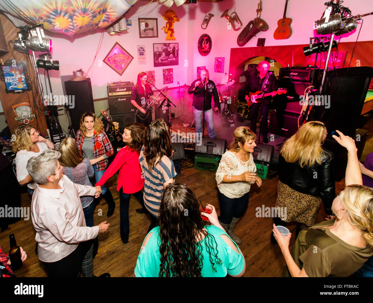 Rock & Roll band Hairitage playing music in the Victoria Tavern; Salida; Colorado; USA Stock Photo