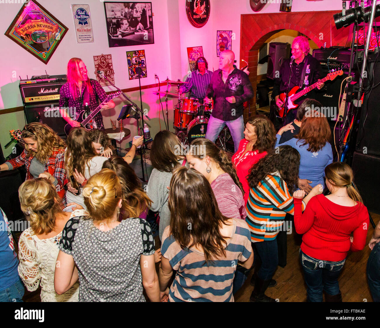 Rock & Roll band Hairitage playing music in the Victoria Tavern; Salida