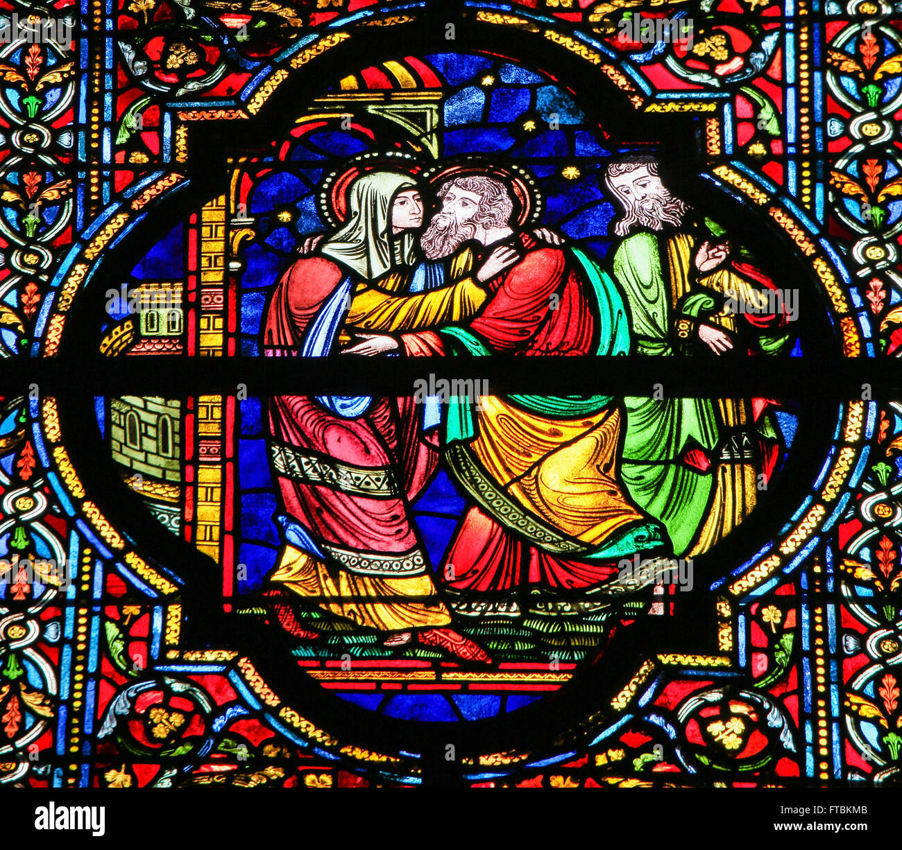 DINANT, BELGIUM - OCTOBER 16, 2011 Stained glass window depicting Mother Mary and Saint Joachim in the Notre Dame church in Dina Stock Photo
