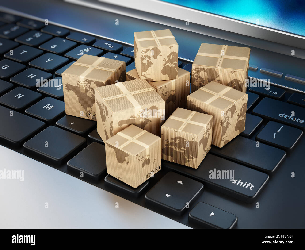 Cardboard boxes standing on laptop computer keyboard Stock Photo Alamy