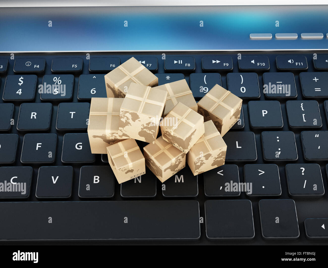 Cardboard boxes standing on laptop computer keyboard Stock Photo Alamy