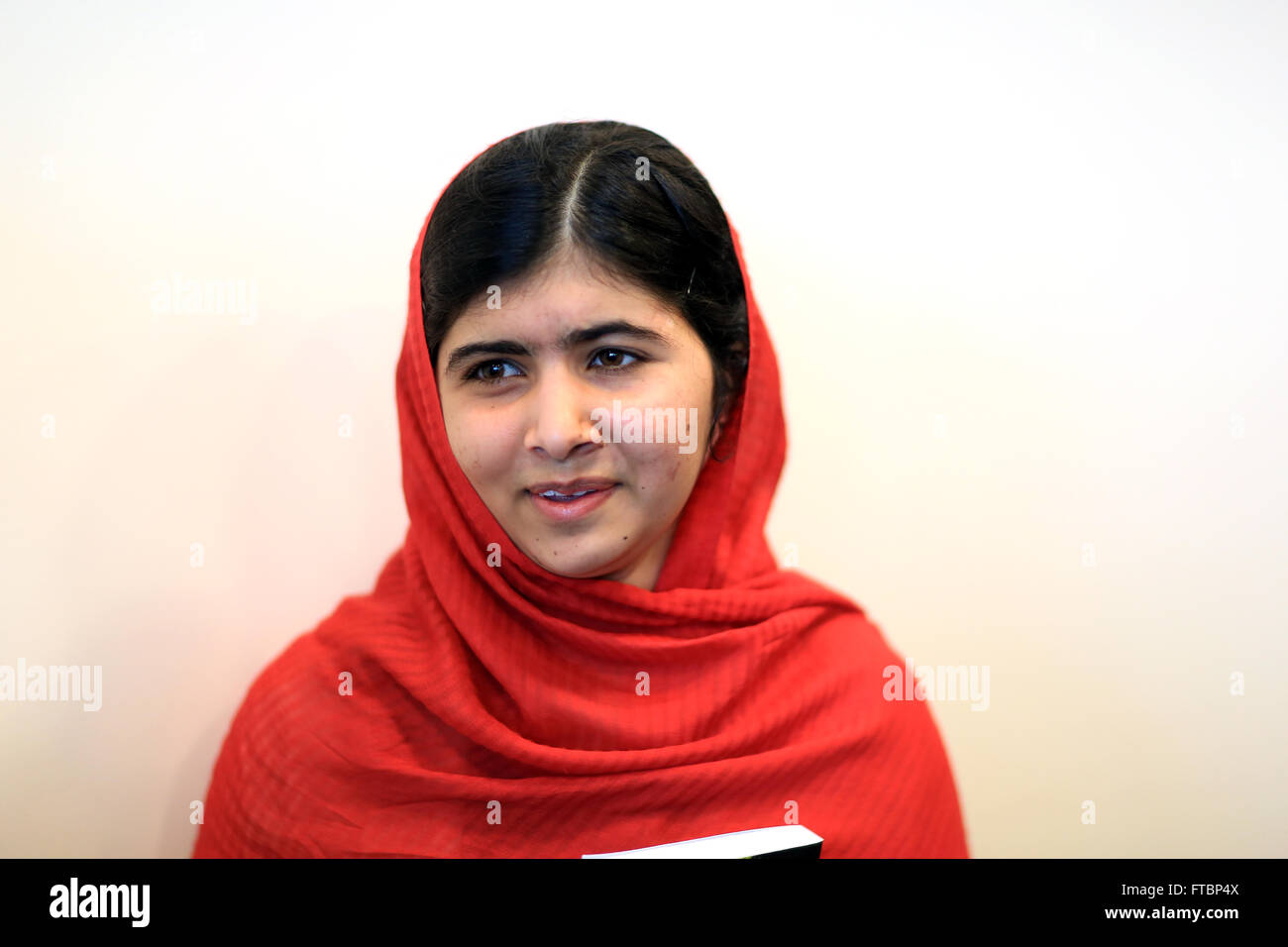 Malala Yousafzai portrait with book Stock Photo