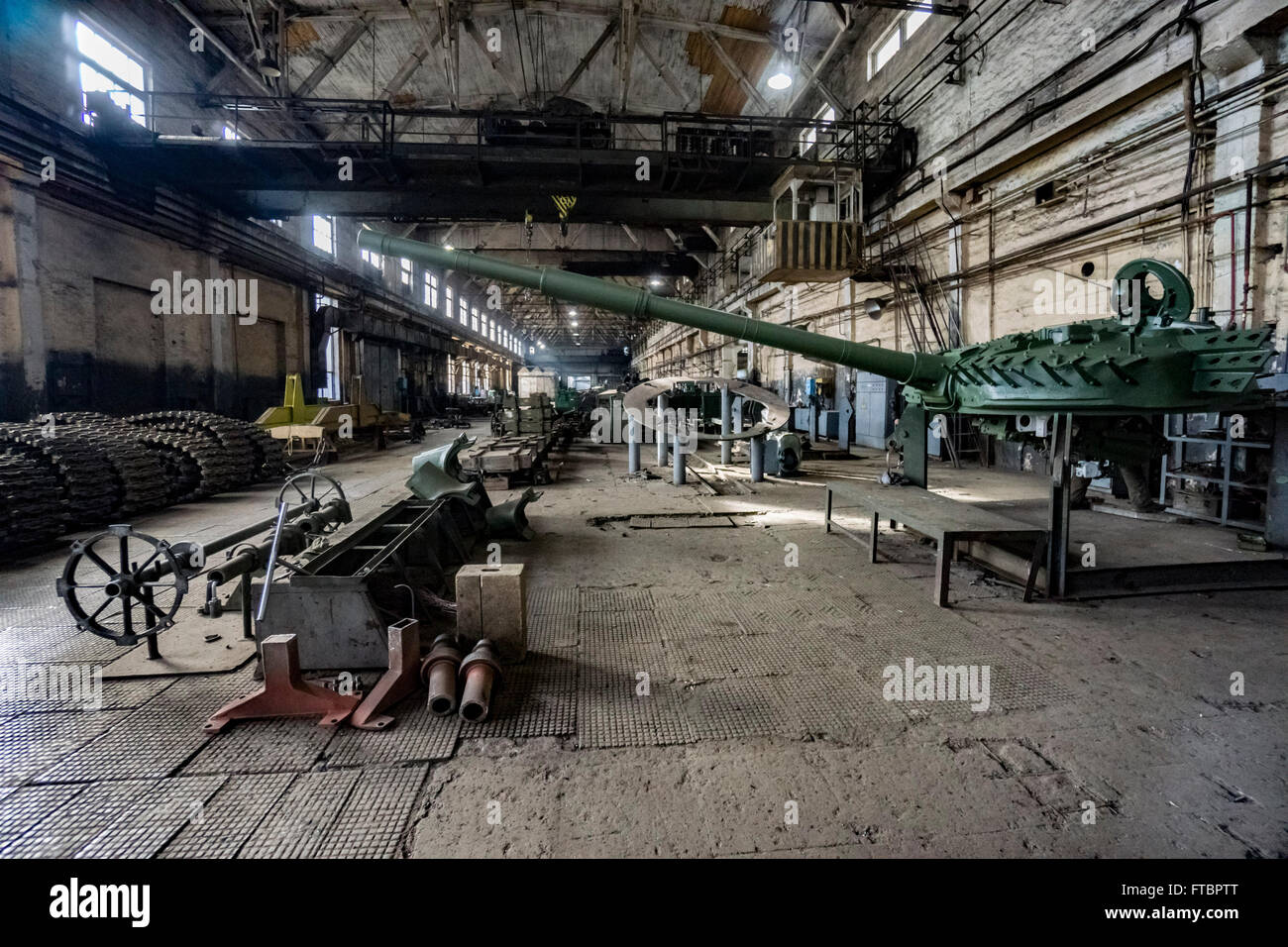 Workers repair tanks in a workshop at the Lviv Armor Plant Stock Photo