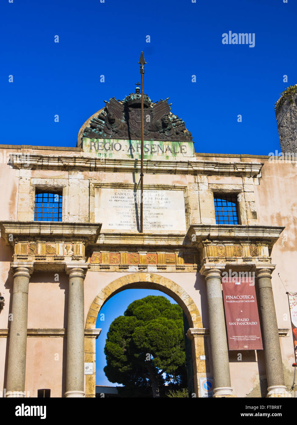 Regio arsenale gate at city square and entrance to archeological museum in Cagliari downtown, Sardinia Stock Photo