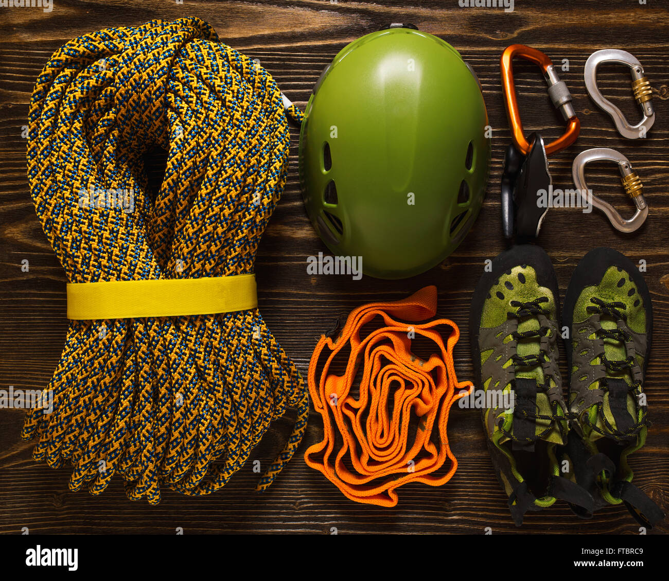 set of basic climbing equipment on rough wood Stock Photo Alamy