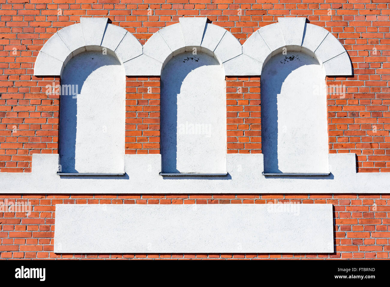 Ahus, Sweden - March 20, 2016: Architectural detail of the Absolut Company factory, the place where Absolut Vodka is made. Red b Stock Photo