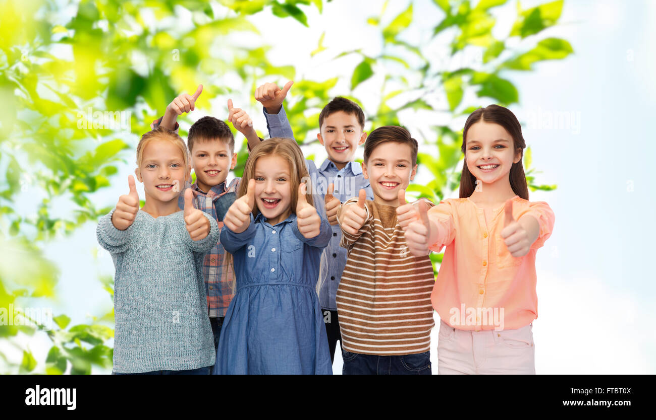 happy children showing thumbs up Stock Photo - Alamy