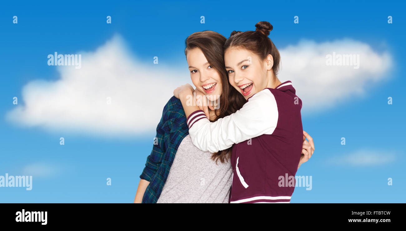 happy smiling pretty teenage girls hugging Stock Photo - Alamy