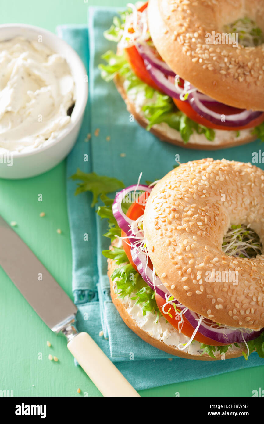 tomato sandwich on bagel with cream cheese onion lettuce alfalfa sprouts Stock Photo Alamy