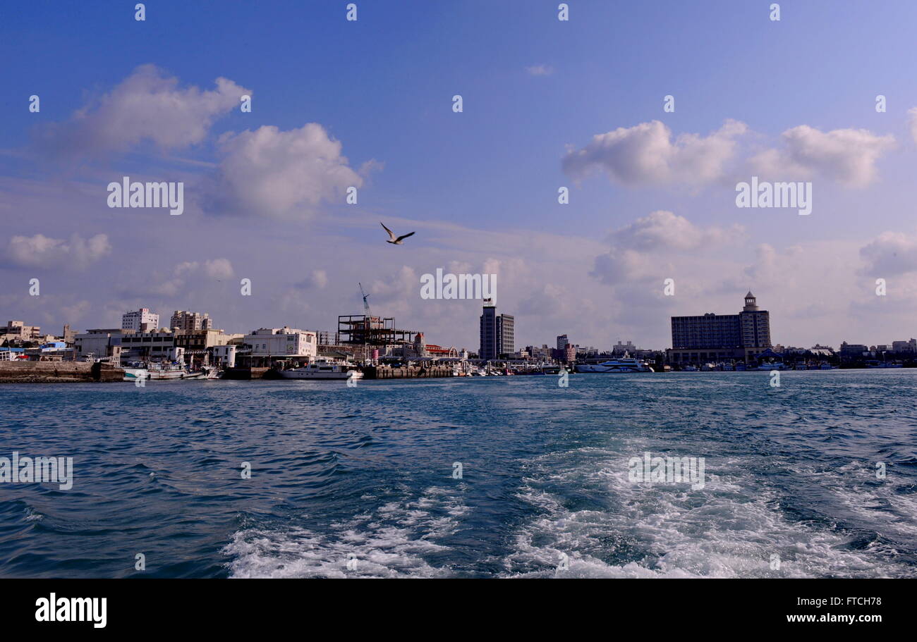 Penghu, China's Taiwan. 27th Mar, 2016. The Magong port is seen in Penghu County, southeast China's Taiwan, March 27, 2016. Clear weather, rising temperature and local scenery attracted many visitors to Penghu in Spring. © Zhang Guojun/Xinhua/Alamy Live News Stock Photo