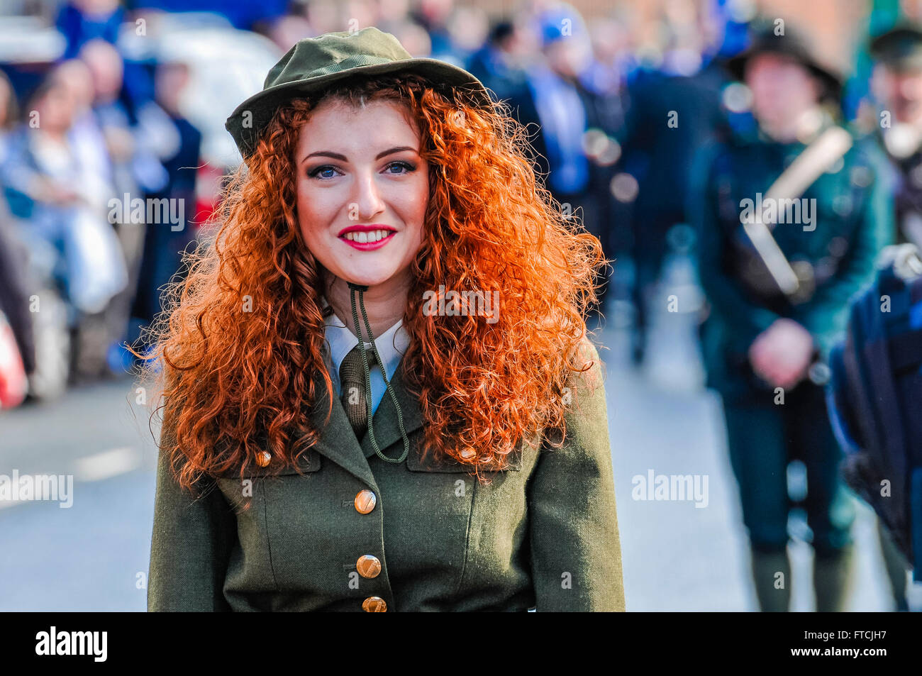 Belfast, Northern Ireland. 27 Mar 2016 - Connlaith Pickering wearing a reproduction military uniform from the Irish Civilian Army (ICA) at the 1916 Irish Easter Rising centenary celebration parade. Credit:  Stephen Barnes/Alamy Live News Stock Photo