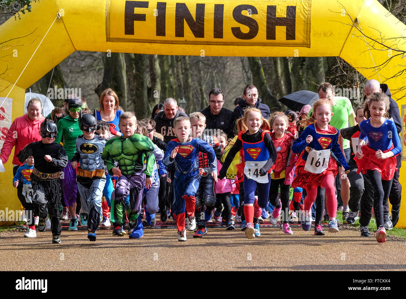Group of young children dressed as super heroes set off on charity race ...