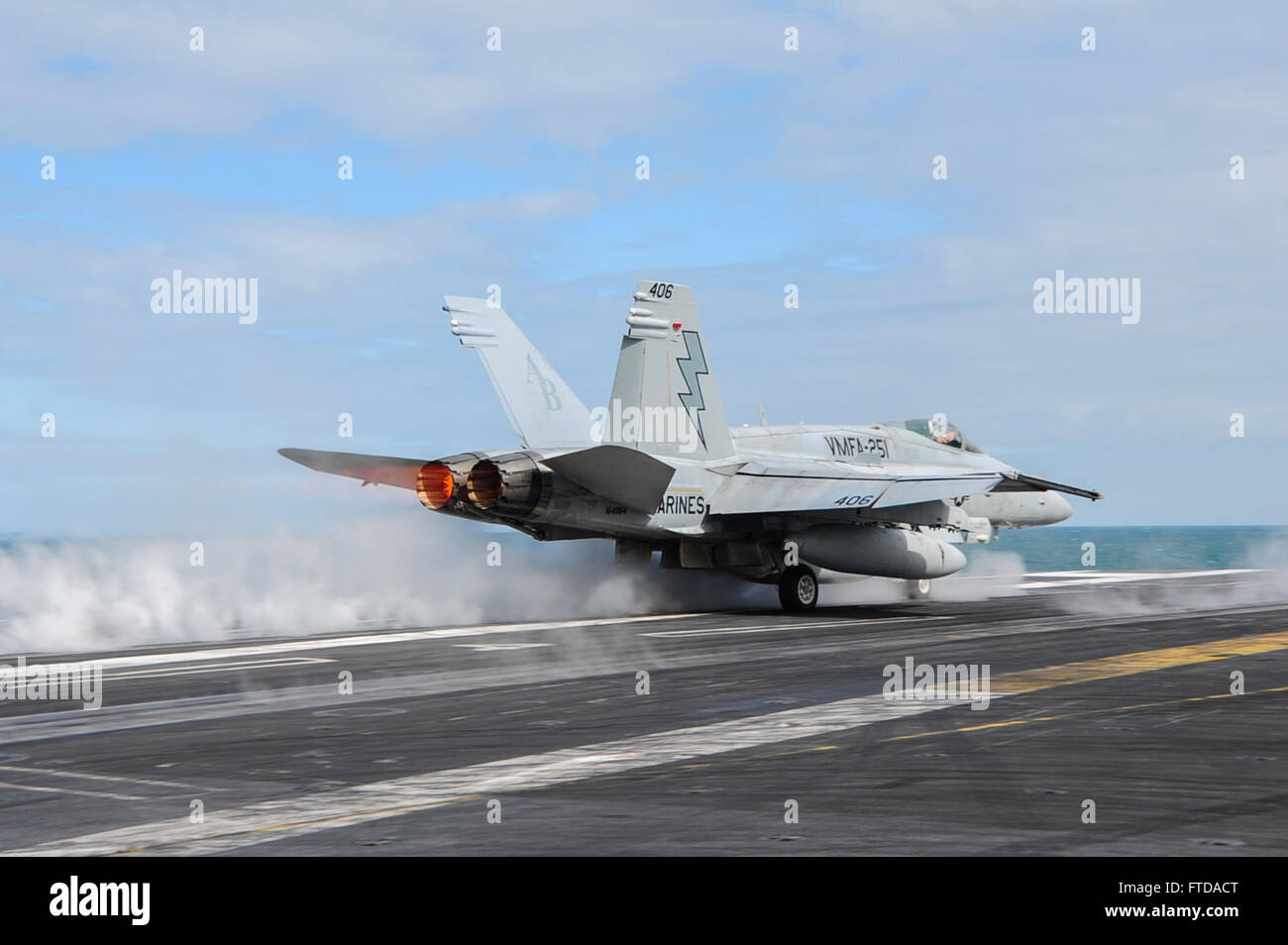 150322-N-ZF498-226 ATLANTIC OCEAN (March 22, 2015) An F/A-18C Hornet assigned to the “Thunderbolts” of Marine Strike Fighter Attack Squadron (VMFA) 251 launches from the flight deck of the Nimitz-class aircraft carrier USS Theodore Roosevelt (CVN 71) March 22, 2015. Theodore Roosevelt, homeported in Norfolk, is conducting naval operations in the U.S. 6th Fleet area of operations in support of U.S. national security interests in Europe. (U.S. Navy photo by Mass Communication Specialist 3rd Class Anthony N. Hilkowski/Released) Stock Photo