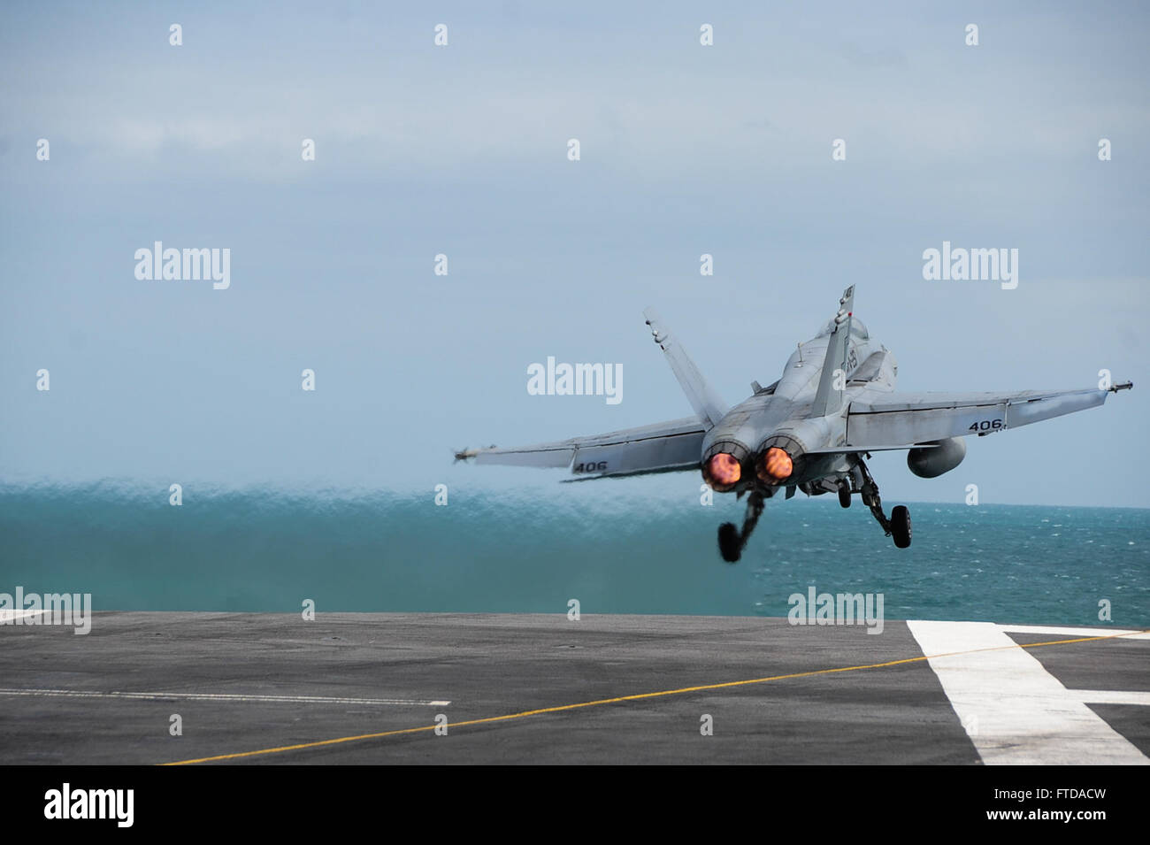 150322-N-ZF498-233 ATLANTIC OCEAN (March 22, 2015) An F/A-18C Hornet, assigned to the “Thunderbolts” of Marine Strike Fighter Attack Squadron (VMFA) 251, launches from the flight deck of the Nimitz-class aircraft carrier USS Theodore Roosevelt (CVN 71) March 22, 2015. Theodore Roosevelt, homeported in Norfolk, is conducting naval operations in the U.S. 6th Fleet area of operations in support of U.S. national security interests in Europe. (U.S. Navy photo by Mass Communication Specialist 3rd Class Anthony N. Hilkowski/Released) Stock Photo