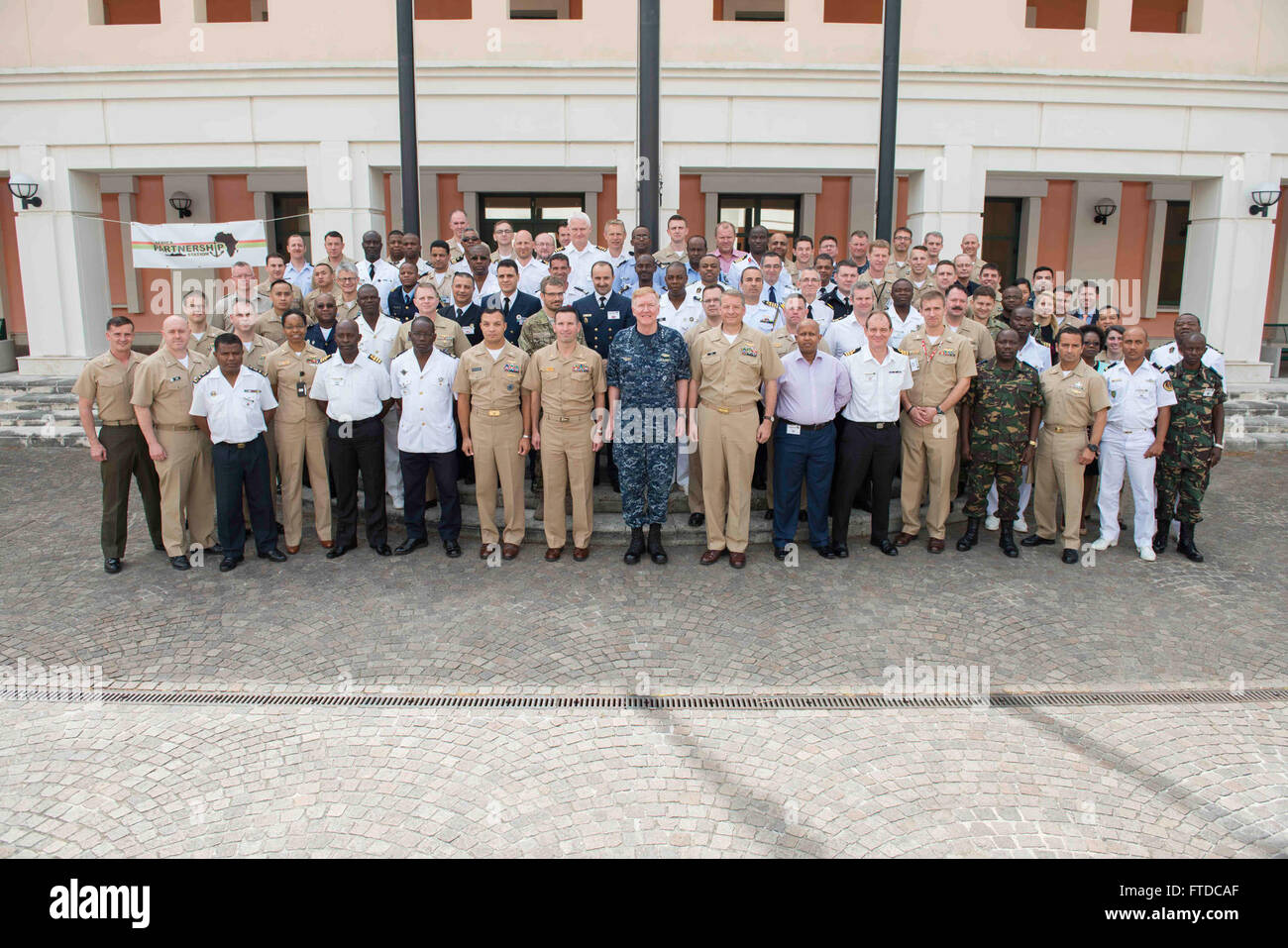 150506-N-OX801-180 NAVAL SUPPORT ACTIVITY NAPLES, Italy (May 6, 2015)  Commander, U.S. 6th Fleet Vice Adm. James Foggo III, center, and participants of the Africa Partnership Station (APS) Annual Planning Conference at Naval Support Activity Naples, Italy, May 6, 2015. The conference aims to align individual African nation maritime security goals, APS training opportunities, and comprehensive regional standards. (U.S. Navy photo by Mass Communication Specialist 3rd Class Daniel P. Schumacher/Released) Stock Photo