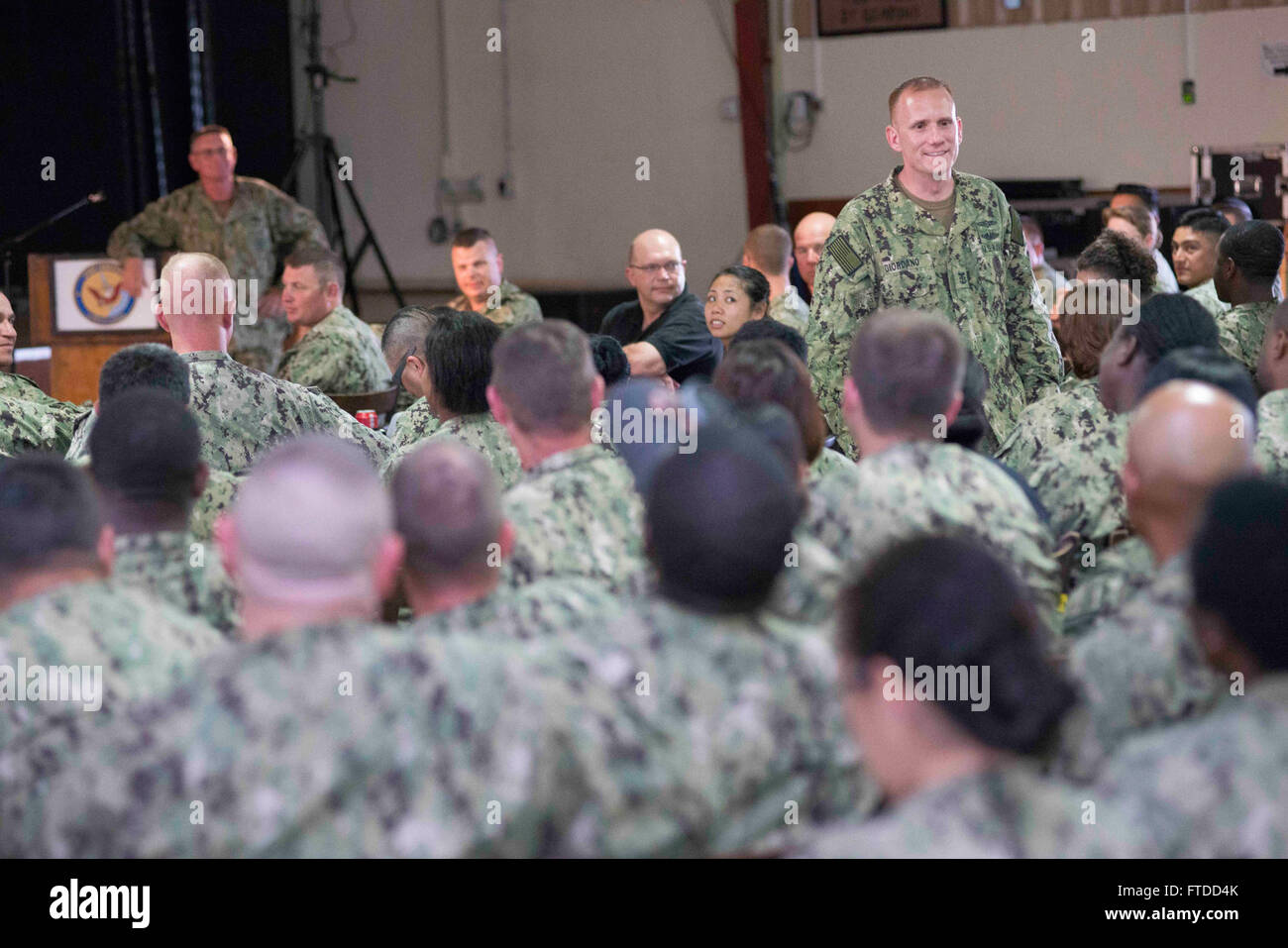 150603-N-OX801-382 CAMP LEMONNIER, Djibouti (June 3, 2015) Naval Forces Europe-Africa Fleet Master Chief Steven Giordano speaks to Sailors at an all-hands call during his visit to Camp Lemonnier in Djibouti, Africa, June 3, 2015. Giordano's visit to Camp Lemonnier and Combined Joint Task Force-Horn of Africa locations served to better understand the commands' quality of work and quality of life, as well as recognizing exemplary Sailors within each command. (U.S. Navy photo by Mass Communication Specialist 2nd Class Daniel P. Schumacher/Released) Stock Photo