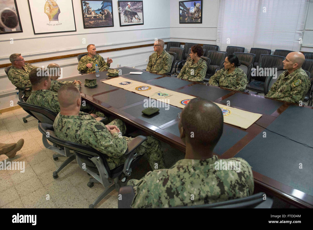 150603-N-OX801-435 CAMP LEMONNIER, Djibouti (June 3, 2015) Naval Forces Europe-Africa Fleet Master Chief Steven Giordano speaks with Combined Joint Task Force-Horn of Africa senior enlisted leadership during his visit to Camp Lemonnier in Djibouti, Africa, June 3, 2015. Giordano's visit to Camp Lemonnier and Combined Joint Task Force-Horn of Africa locations served to better understand the commands' quality of work and quality of life, as well as recognizing exemplary Sailors within each command. (U.S. Navy photo by Mass Communication Specialist 2nd Class Daniel P. Schumacher/Released) Stock Photo